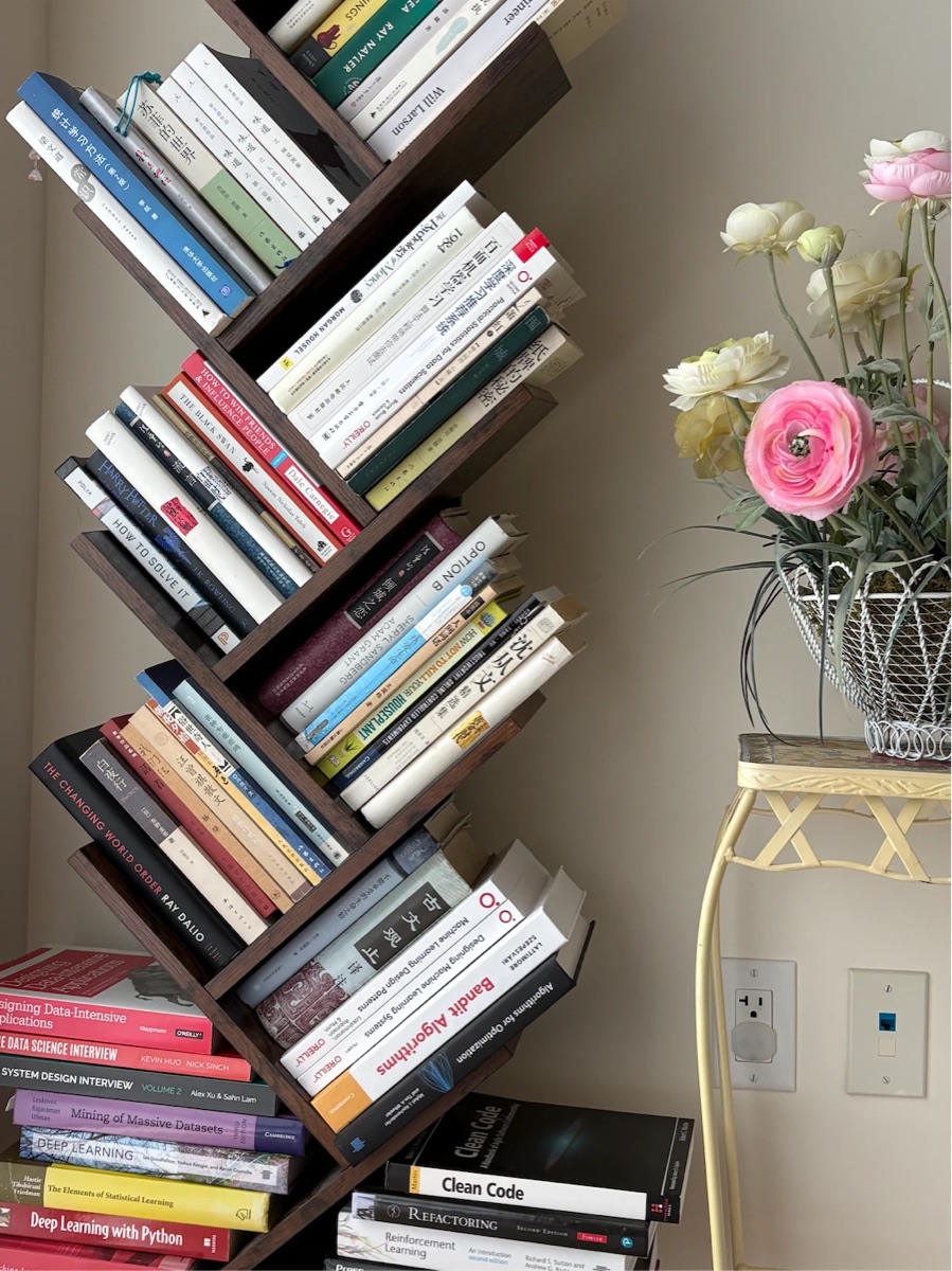 A tree-shaped bookshelf full of books